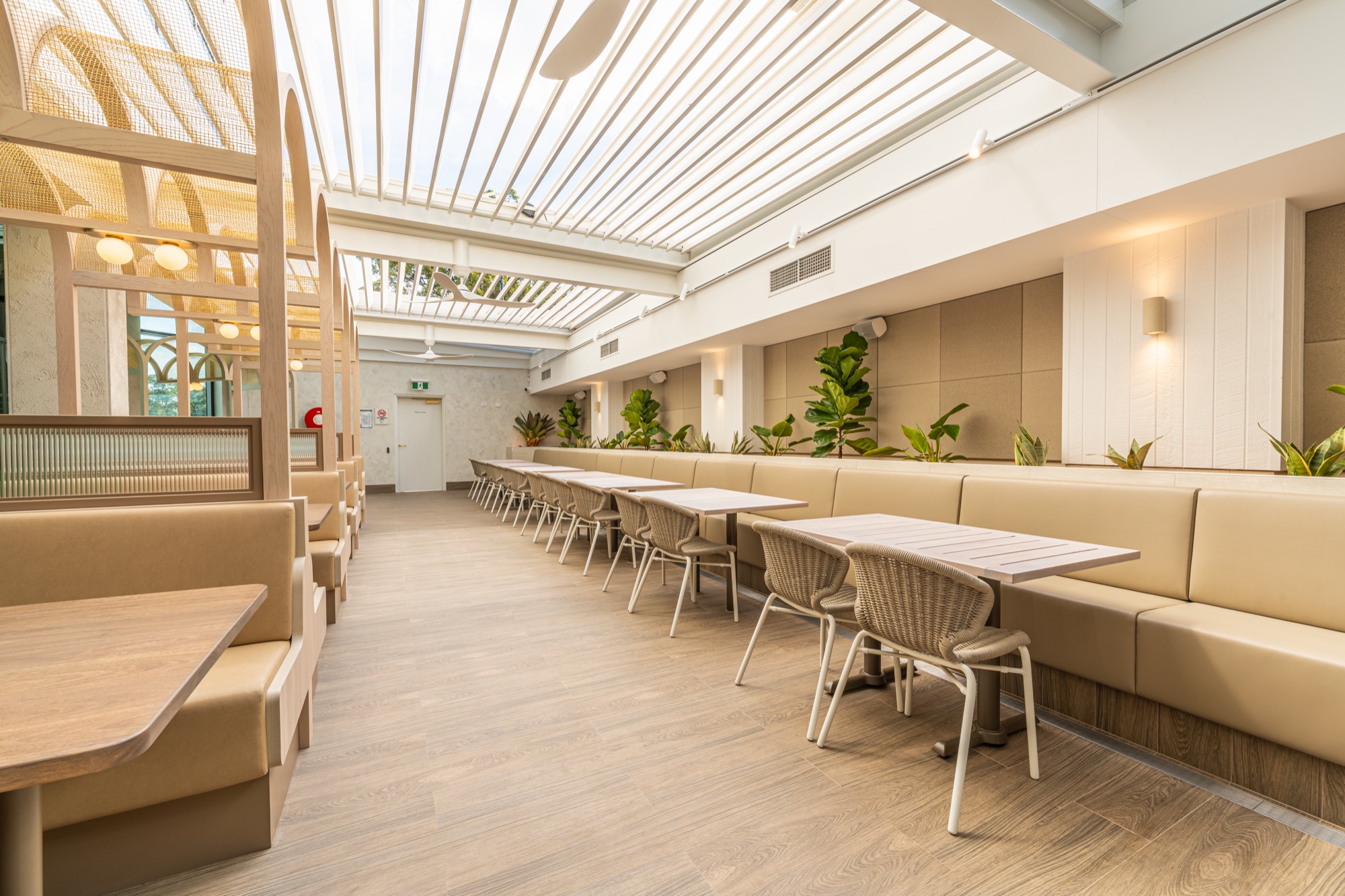 Louvre roof with adjustable blades above indoor-outdoor dining, Chipping Norton Hotel Sydney