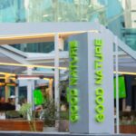 Thumbnail of Good Nature Hotel signage beneath the retractable roof structure