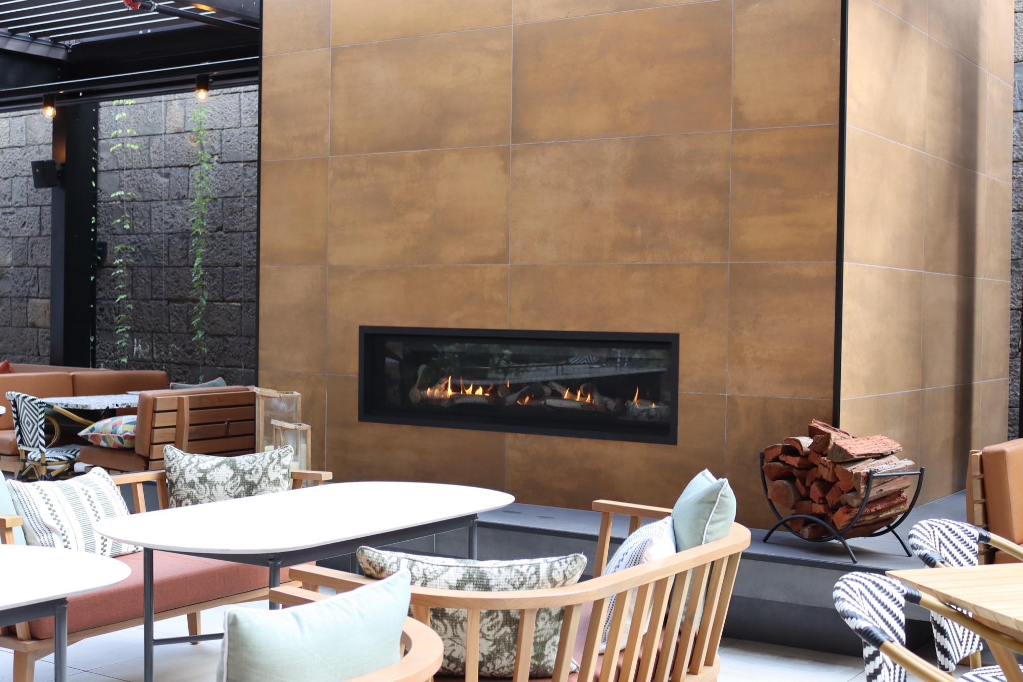 Suntech AXIS MAX operable louvre roof over the outdoor dining area at Adina Apartment Hotel, Pentridge Prison precinct, Coburg Melbourne